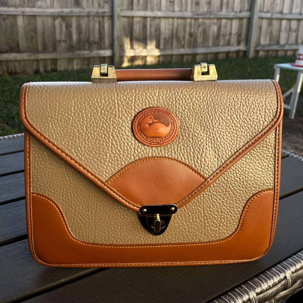 dooney & bourke leather bag. Used, but still shiny